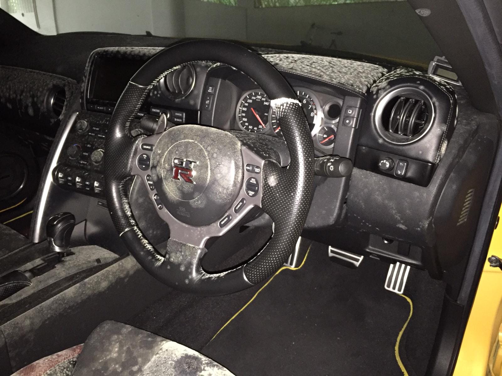 Mould across a car dashboard and steering area