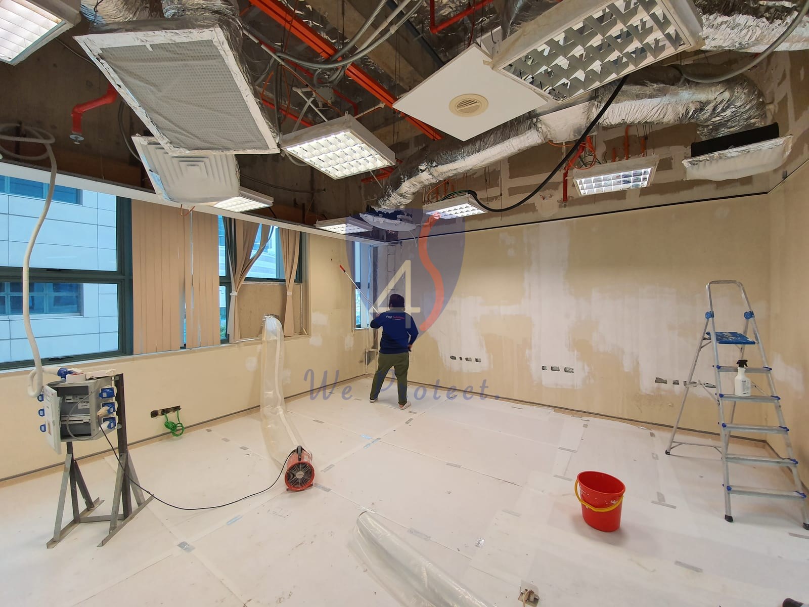 Four Solutions carrying out commercial mould remediation in an occupied office