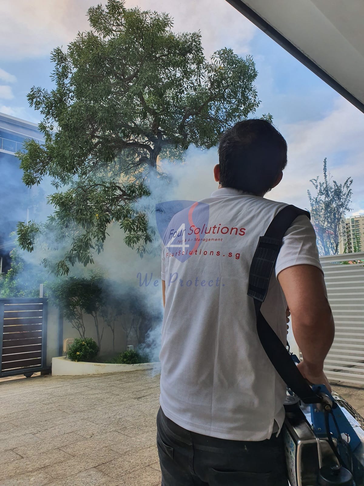 Four Solutions mosquito control team fogging a property in Singapore