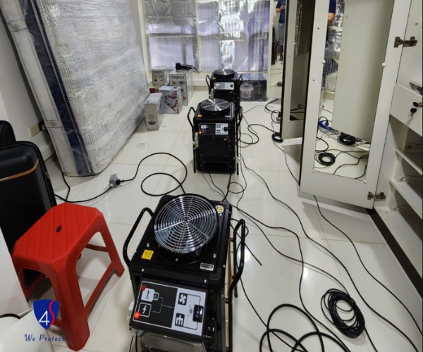 Four Solutions controlled heat treatment equipment set up in a room